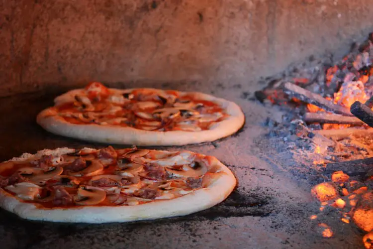 Pizza in traditional oven Apecchio, Marche, Italy