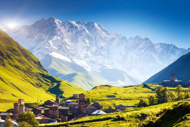 Beautiful Ushguli in Georgia with mountains in background