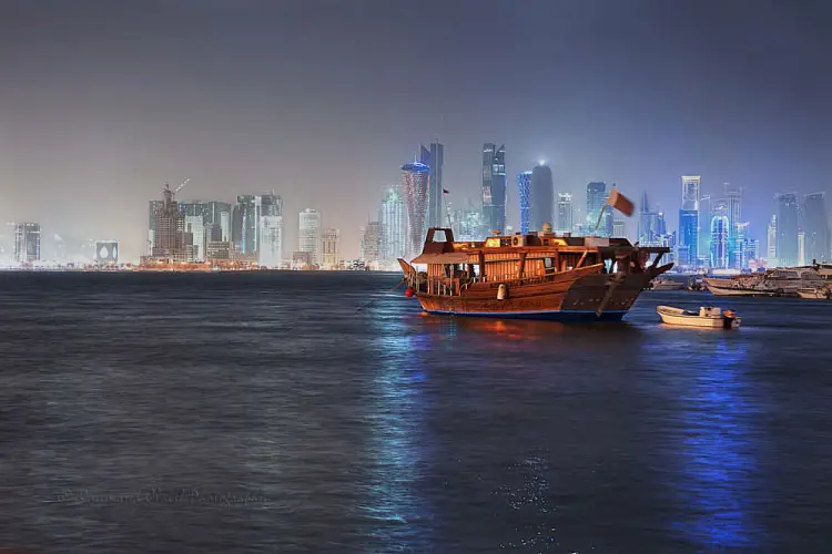 Doha skyline from the water by night