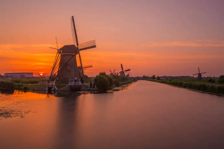 Sunset over the windmills at Kinderdijk - One of Holland's World Heritage Sites