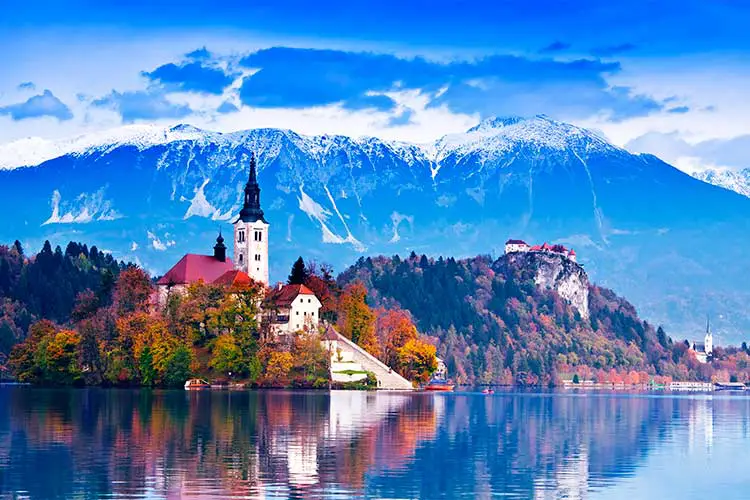 Bled with lake, island, castle and mountains in background, Slovenia