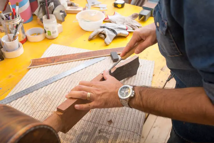 Luthier working on his next guitar