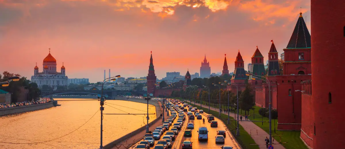 Traffic at sunset near the Kremlin wall in Moscow