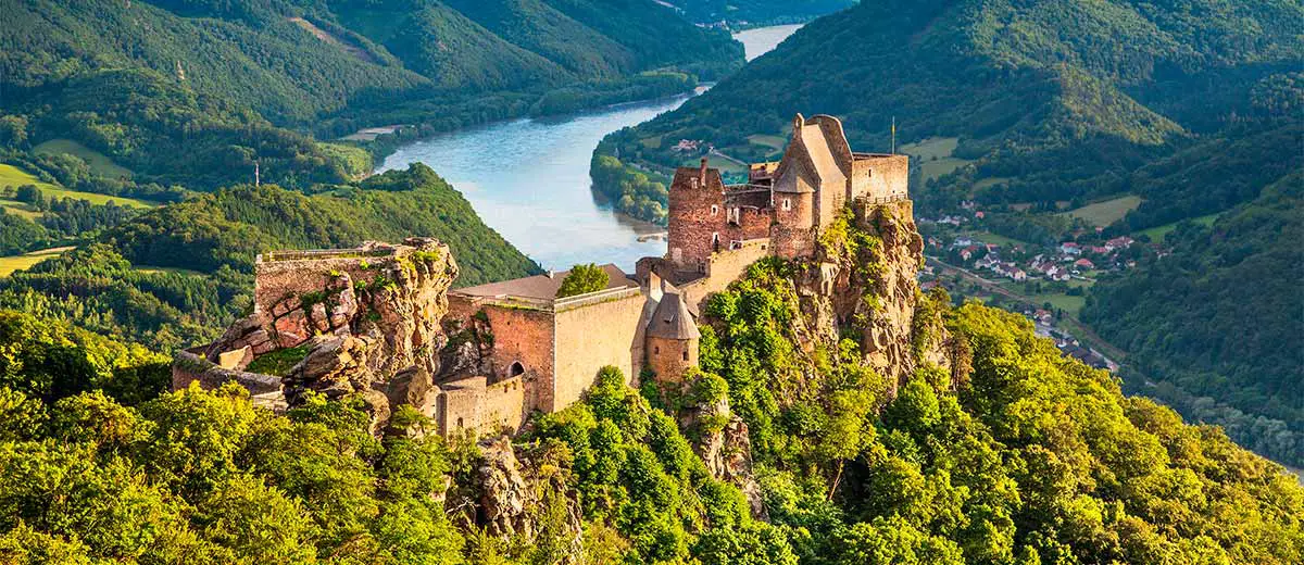 Aggstein castle ruin and Danube river at sunset in Wachau, Austria