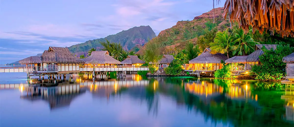 Overwater Bungalows at dusk in Moorea