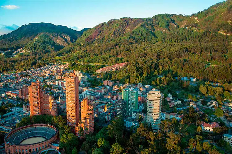 A view of the center of Bogota with the Andes in the background