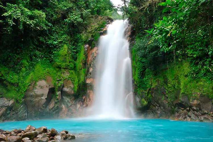 Celestial blue waterfall in Costa Rica