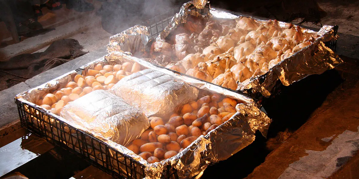 Hāngi being cooked