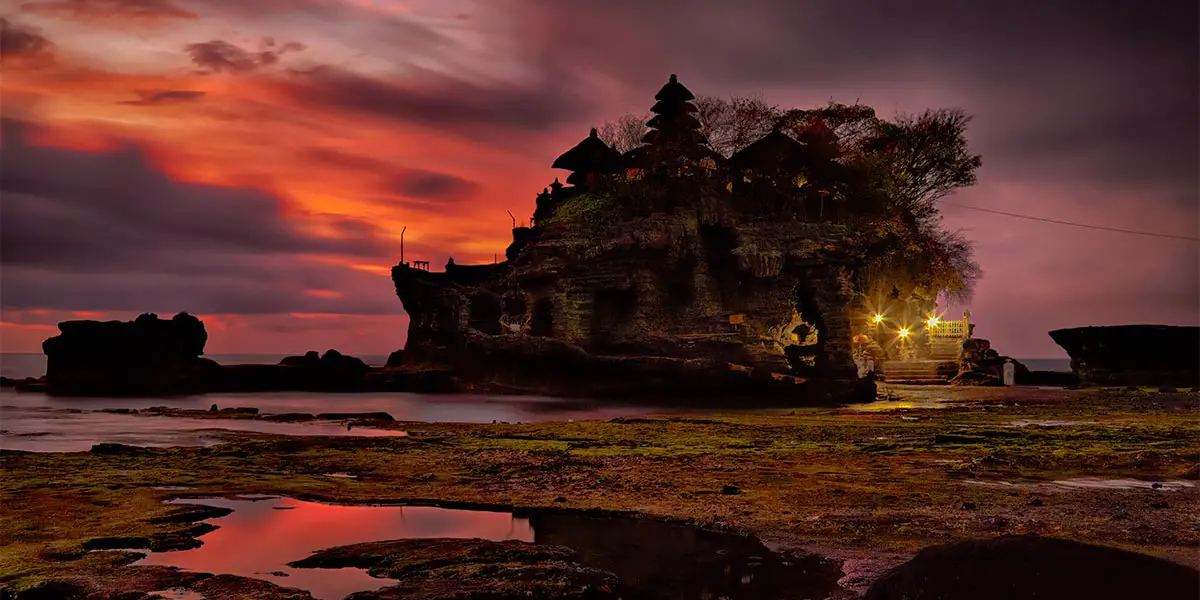 Sunset over hindu temple Pura Tanah Lot, Bali